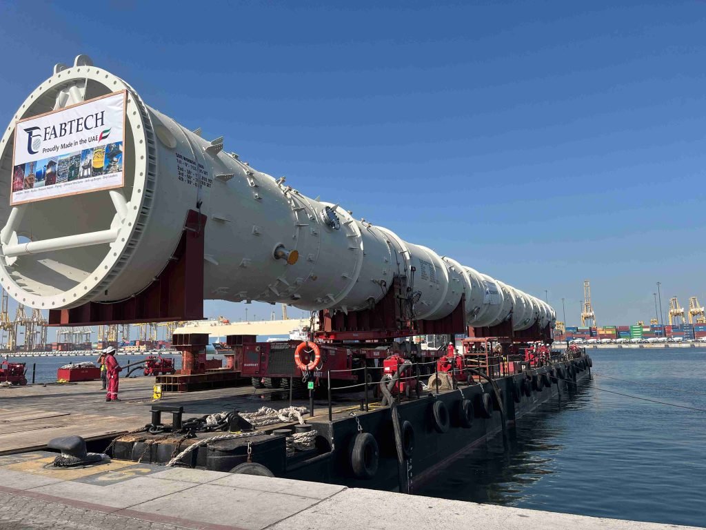 Large splitter column on multi-axle trailer ready for transport