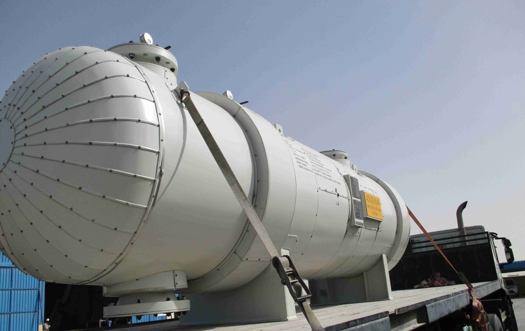 Fabricated vessel in yard with labels