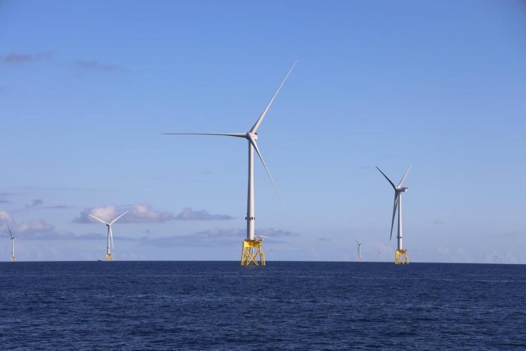 Offshore wind turbine foundation structures installed at sea.