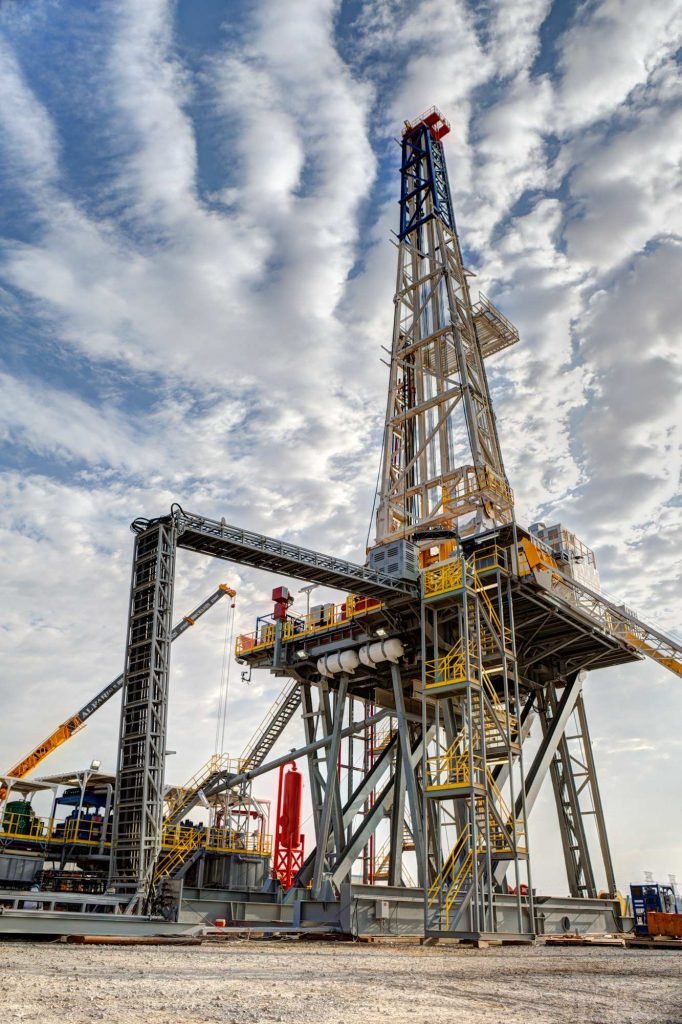 Oil rig under cloudy sky