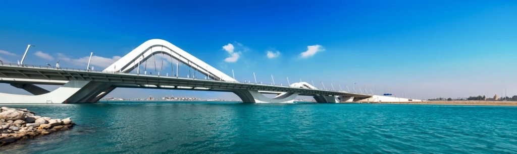 White bridge over blue water