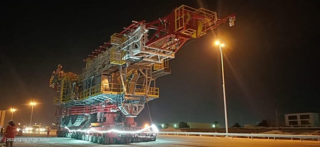 Industrial rig lit at night