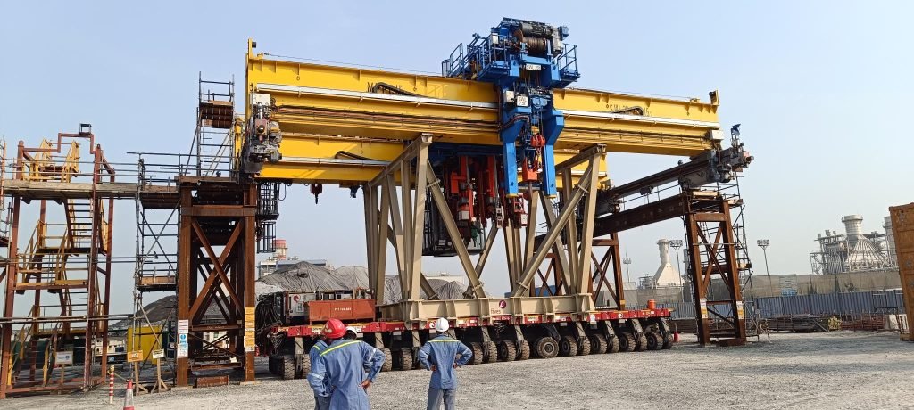 Heavy-duty yellow structure with workers