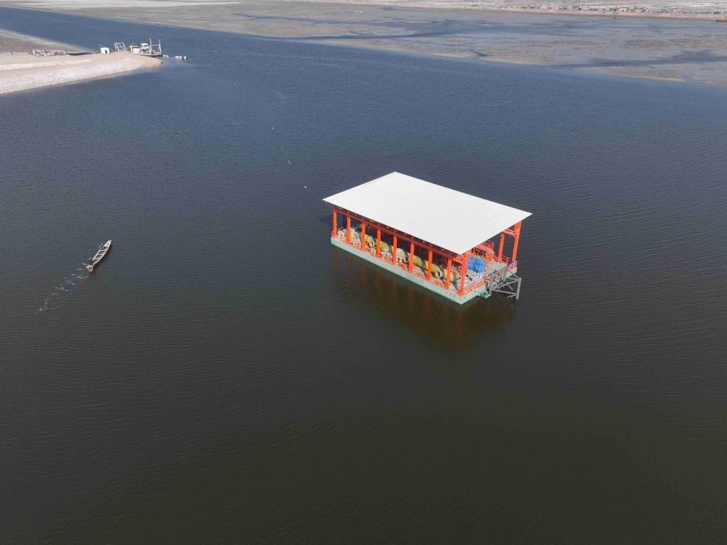 solated floating structure on water, captured from above.