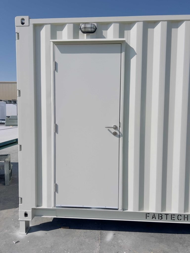 White metal door on prefab unit