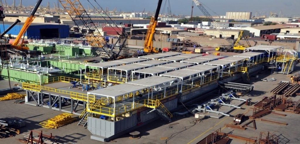 Shipyard construction site with workers