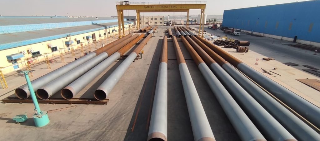 Steel pipes stacked in yard