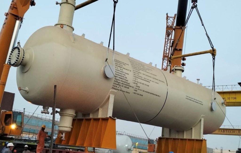 Angled industrial tank with flanges